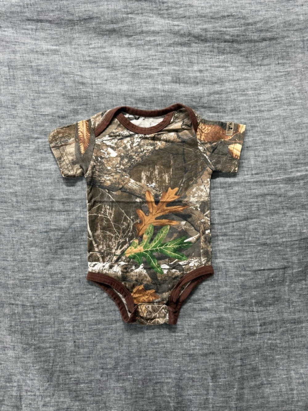 NWOT short sleeve camo onesie